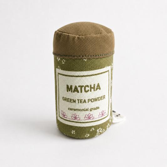 Play Food Matcha green tea powder container with label on a white background