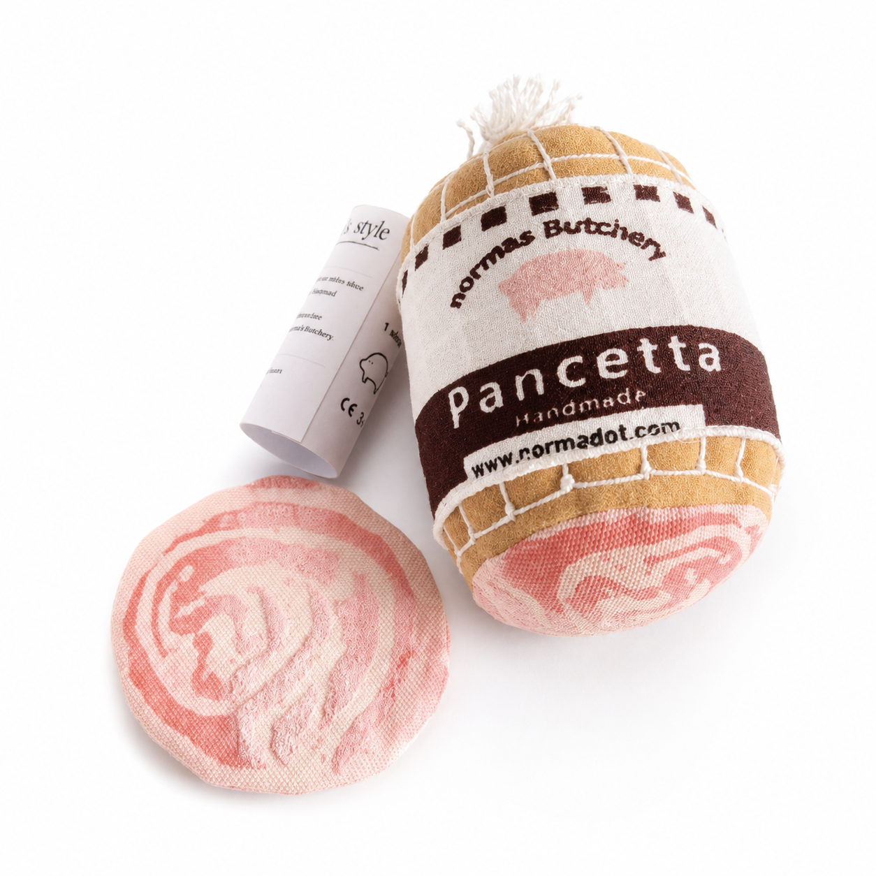 Pancetta toy with packaging on a white background